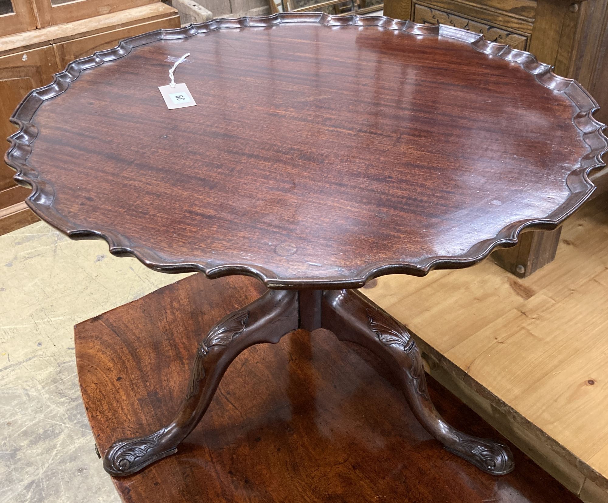 A Chippendale style mahogany circular pie-crust coffee table (cut down) 70cm diameter, height 51cm